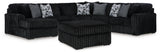 Midnight-Madness 4-Piece Sectional with Ottoman in Onyx from Ashley Furniture - Luna Furniture