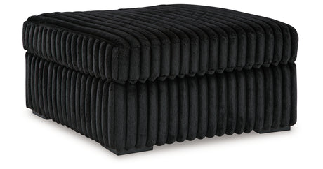 Midnight-Madness 4-Piece Sectional with Ottoman in Onyx from Ashley - Luna Furniture
