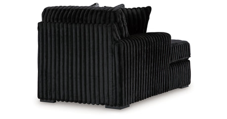 Midnight-Madness 4-Piece Sectional with Ottoman in Onyx from Ashley - Luna Furniture