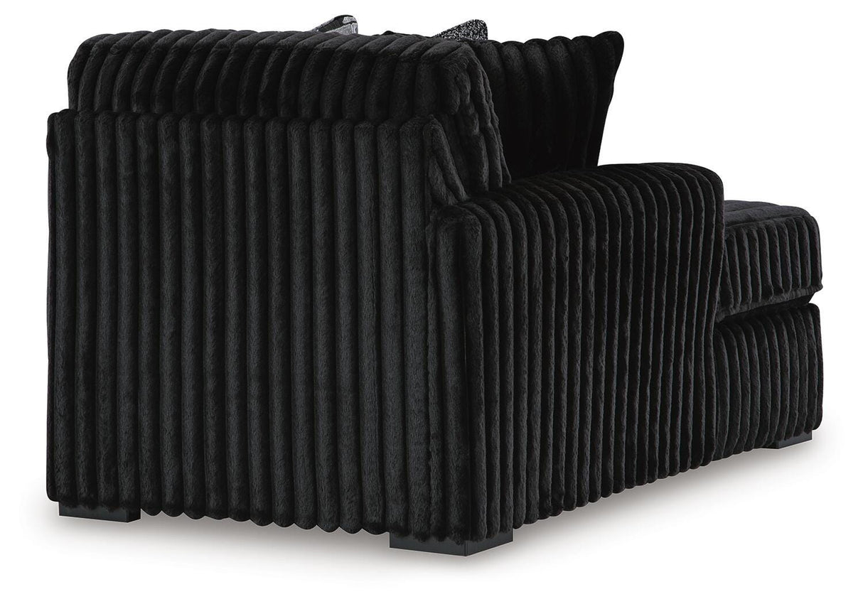 Midnight-Madness 3-Piece Sectional with Ottoman in Onyx from Ashley Furniture - Luna Furniture