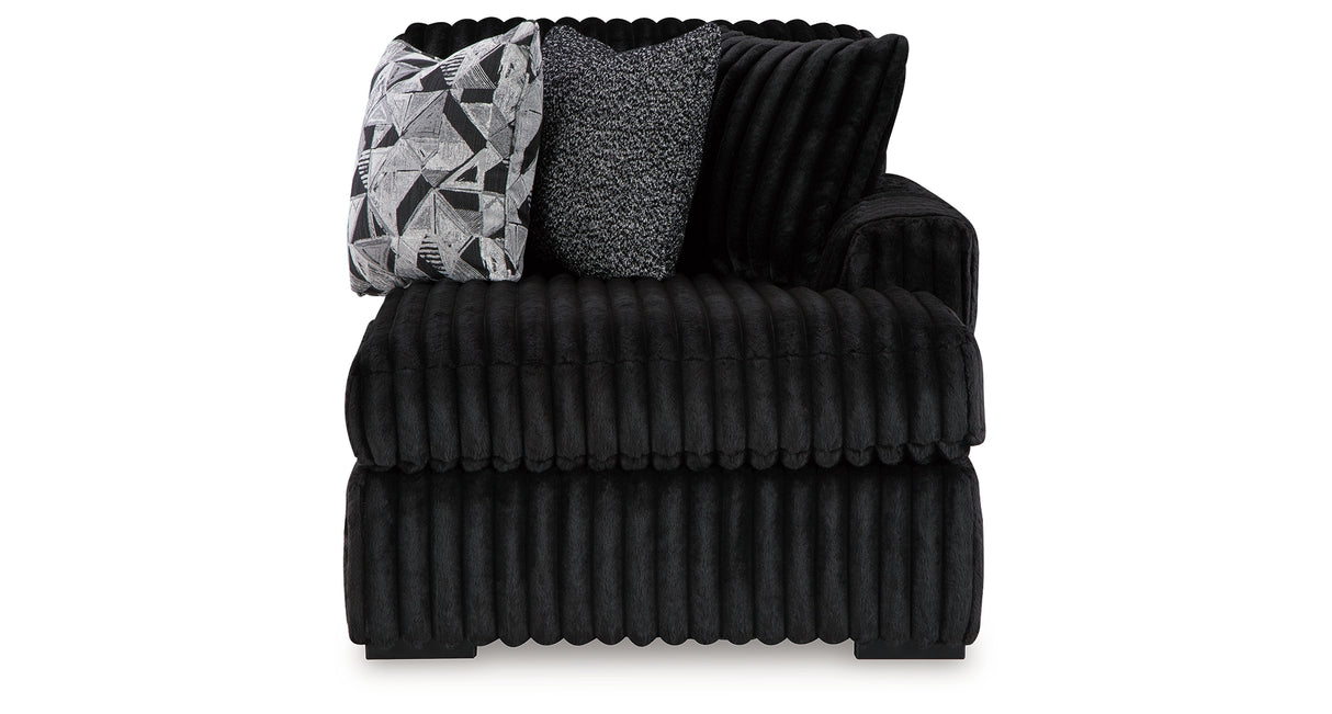 Midnight-Madness Onyx RAF Chase Sectional and Ottoman from Ashley Furniture - Luna Furniture