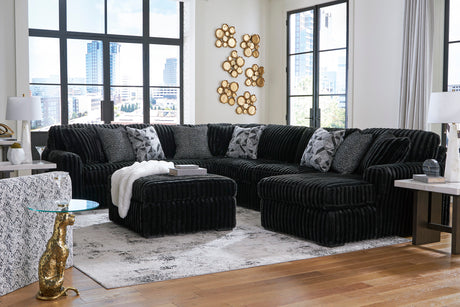 Midnight-Madness 4-Piece Sectional with Ottoman in Onyx from Ashley - Luna Furniture