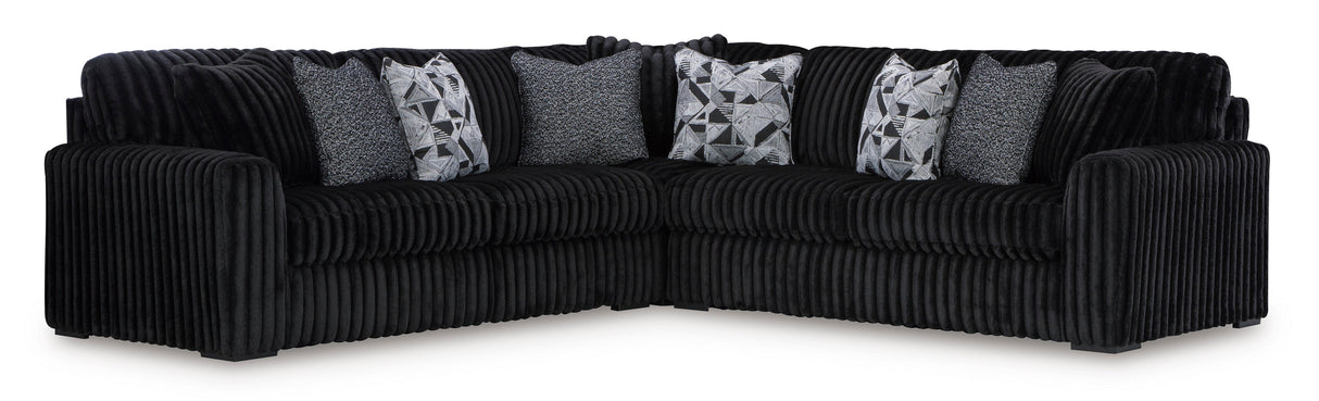 Midnight-Madness 3-Piece Sectional with Ottoman in Onyx from Ashley - Luna Furniture