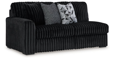 Midnight-Madness 4-Piece Sectional with Ottoman in Onyx from Ashley - Luna Furniture