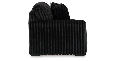 Midnight-Madness 4-Piece Sectional with Ottoman in Onyx from Ashley - Luna Furniture