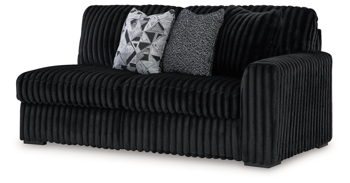 Midnight-Madness 4-Piece Sectional with Ottoman in Onyx from Ashley Furniture - Luna Furniture