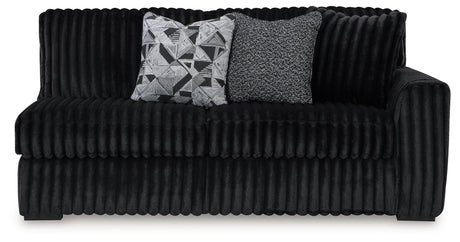Midnight-Madness 4-Piece Sectional with Ottoman in Onyx from Ashley - Luna Furniture