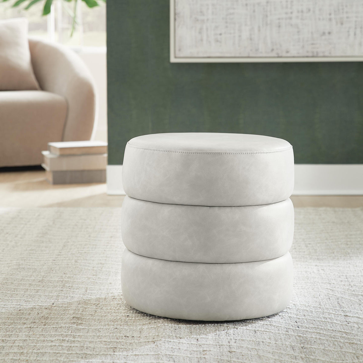 Ummi Bone Swivel Accent Ottoman from Ashley - Luna Furniture