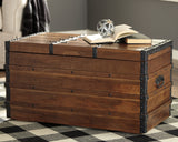 Kettleby Brown Storage Trunk from Ashley Furniture - Luna Furniture