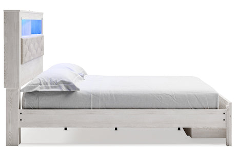 Altyra White King Upholstered LED Bookcase Storage Panel Bed from Ashley - Luna Furniture