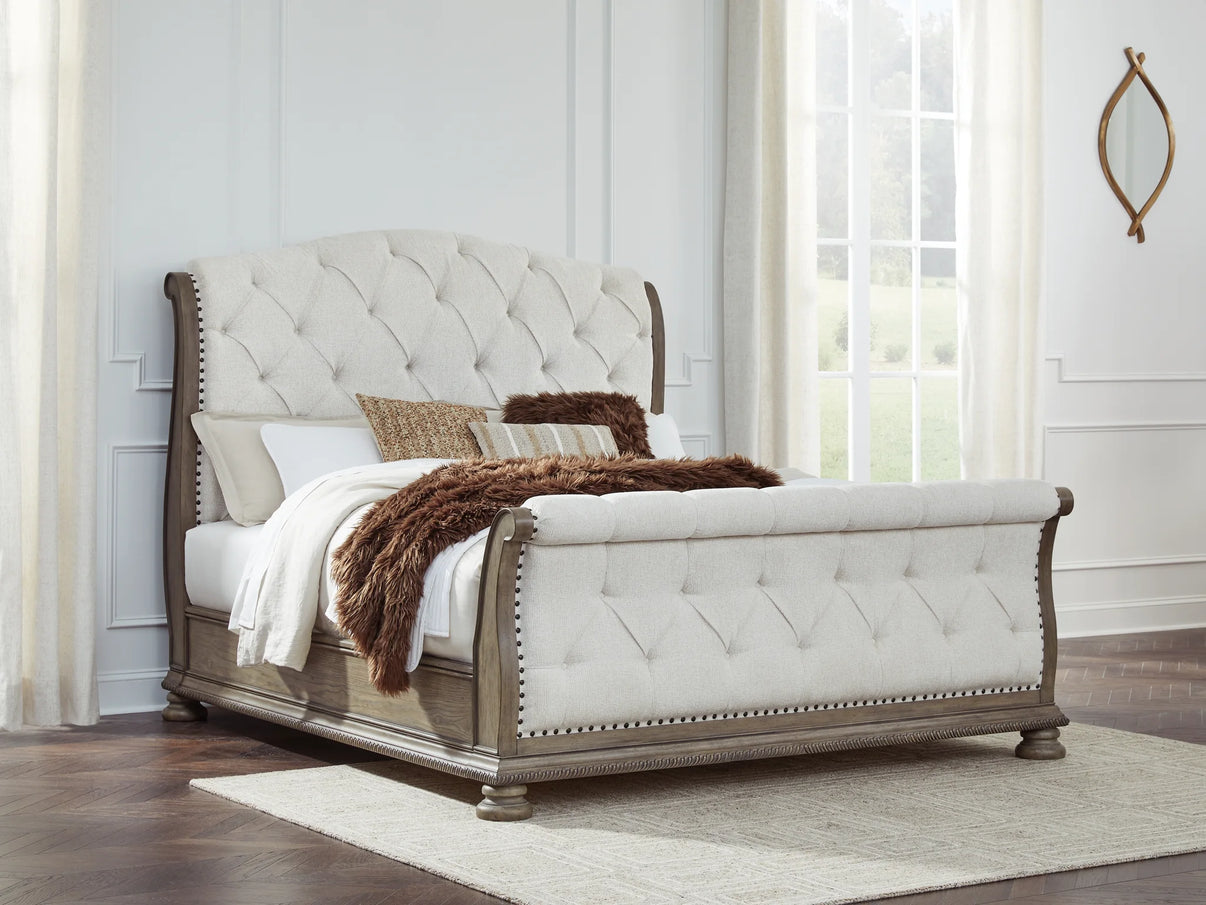 Ardenfield Light Brown Queen Upholstered Sleigh Bed from Ashley - Luna Furniture