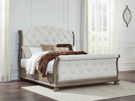 Ardenfield Light Brown Queen Upholstered Sleigh Bed from Ashley - Luna Furniture