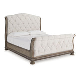 Ardenfield Light Brown Queen Upholstered Sleigh Bed from Ashley - Luna Furniture