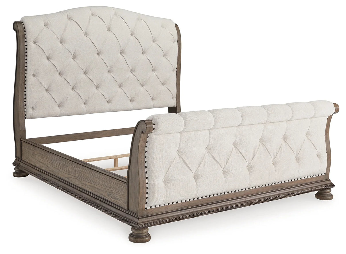 Ardenfield Light Brown Queen Upholstered Sleigh Bed from Ashley - Luna Furniture