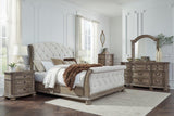 Ardenfield Light Brown King Upholstered Sleigh Bed from Ashley - Luna Furniture