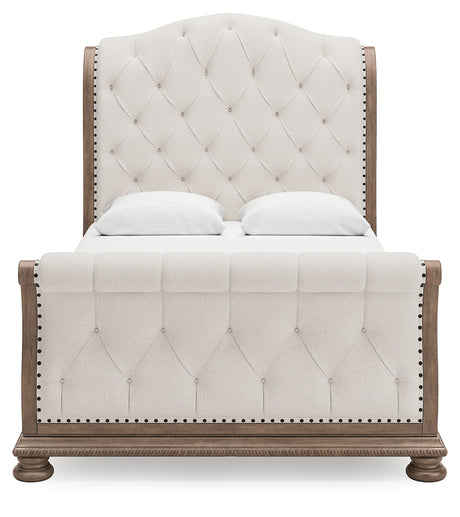 Ardenfield Queen Upholstered Sleigh Bed with Mirrored Dresser in Light Brown from Ashley - Luna Furniture