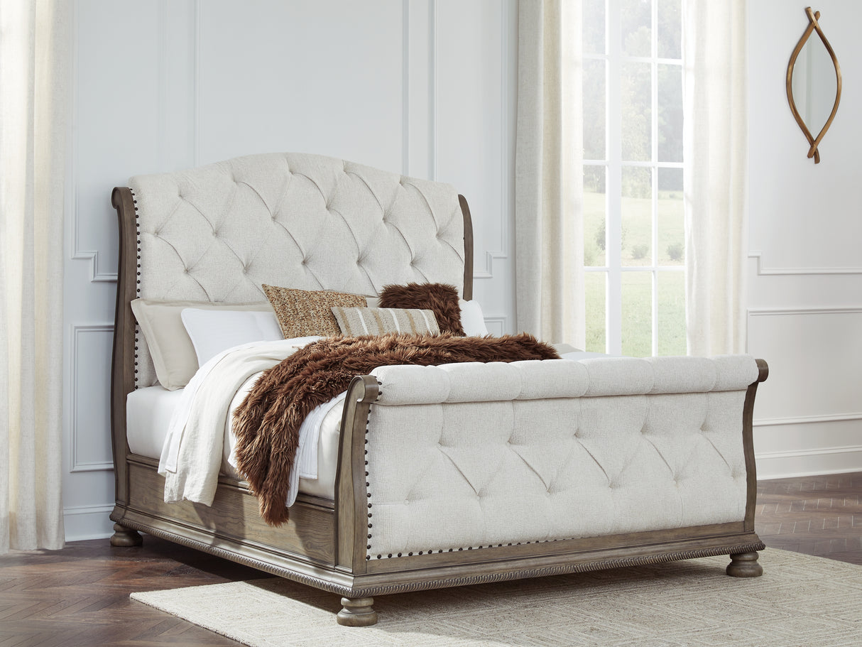 Ardenfield Queen Upholstered Sleigh Bed with Mirrored Dresser in Light Brown from Ashley Furniture - Luna Furniture