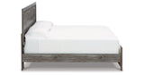 Bronyan King Panel Bed with Mirrored Dresser, Chest and 2 Nightstands in Dark Gray from Ashley Furniture - Luna Furniture