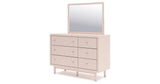 Wistenpine Twin Upholstered Panel Headboard with Mirrored Dresser in Blush from Ashley - Luna Furniture