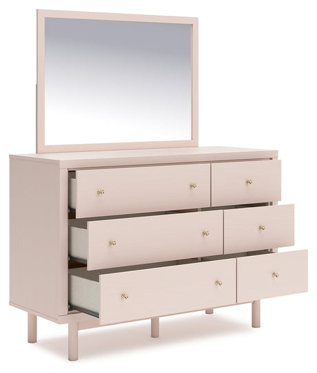 Wistenpine Blush Twin Upholstered Panel Headboard with Mirrored Dresser from Ashley Furniture - Luna Furniture