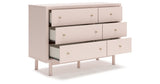 Wistenpine Full Upholstered Panel Headboard with Dresser and 2 Nightstands in Blush from Ashley - Luna Furniture