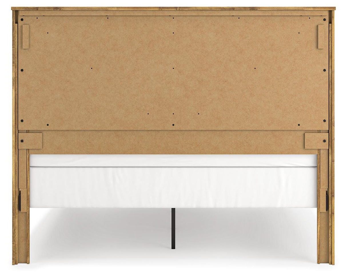 Maystonna Ardenfield Light Brown King Upholstered Sleigh Bed, Dresser, Mirror, Chest and 2 NightstandsKing Crossbuck Panel Bed, Dresser, Mirror and Nightstand from Ashley - Luna Furniture