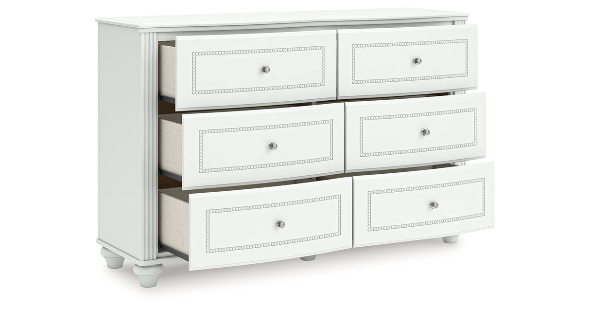 Kozlani Twin Upholstered Panel Storage Bed with Dresser and Chest in White from Ashley - Luna Furniture