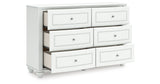 Kozlani Twin Upholstered Panel Storage Bed with Dresser and Chest in White from Ashley - Luna Furniture