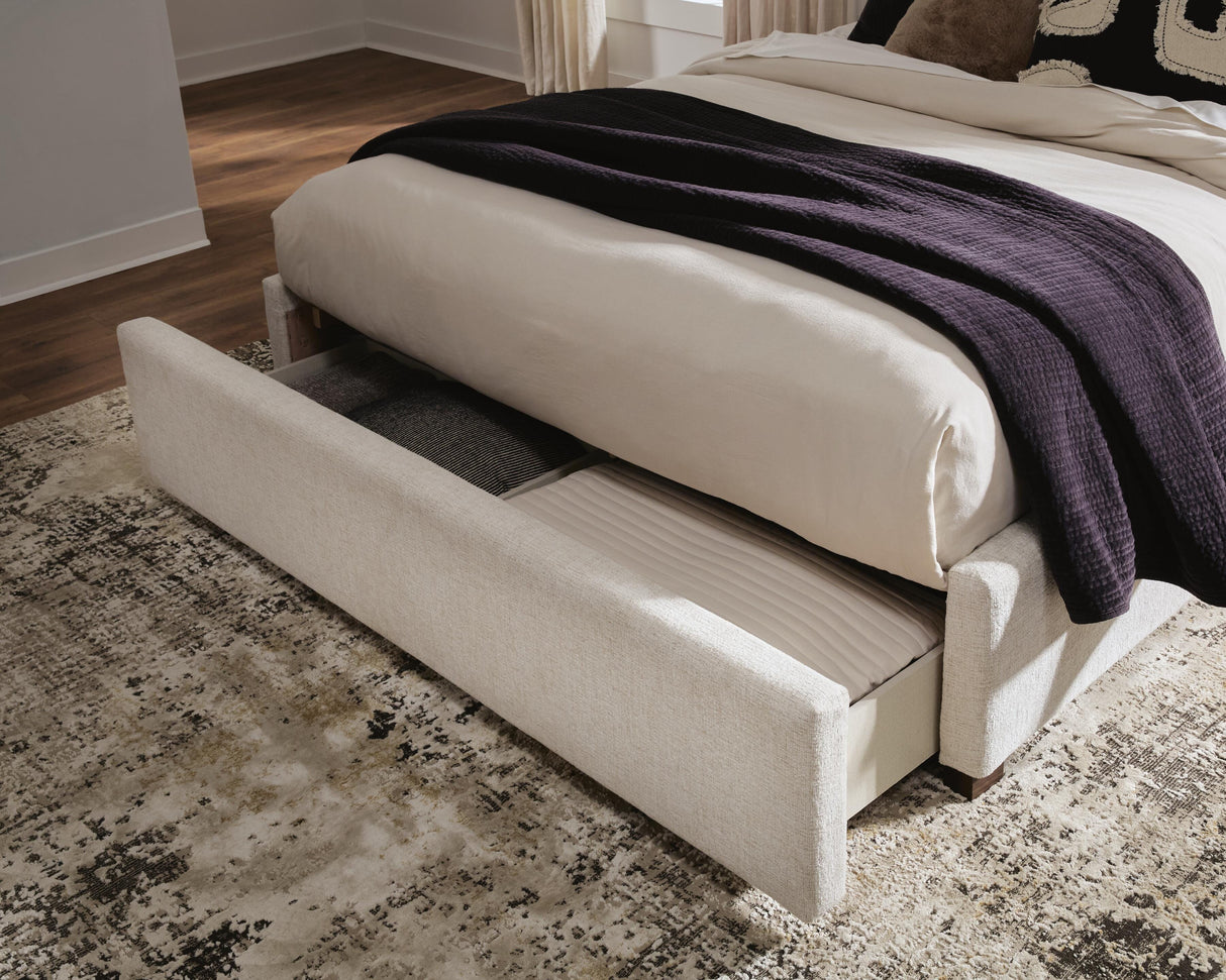 Brizmore Beige Queen Upholstered Storage Bed from Ashley - Luna Furniture