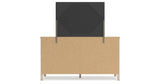 Cadmori Queen Upholstered Panel Bed with Mirrored Dresser and Nightstand in Two-tone from Ashley - Luna Furniture