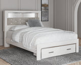 Altyra White Queen Upholstered LED Bookcase Storage Platform Bed from Ashley Furniture - Luna Furniture