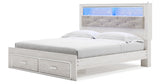 Altyra White King Upholstered LED Bookcase Storage Platform Bed from Ashley Furniture - Luna Furniture