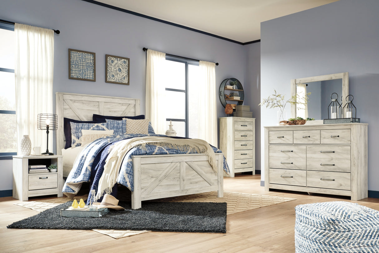 Bellaby Queen Crossbuck Panel Bed with Mirrored Dresser, Chest and Nightstand in Whitewash from Ashley Furniture - Luna Furniture