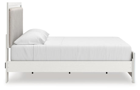 Zuraleus White King Upholstered Panel Bed with Mirrored Dresser and Chest from Ashley - Luna Furniture