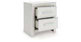 Zuraleus White King Upholstered Panel Storage Bed with Dresser and Nightstand from Ashley - Luna Furniture