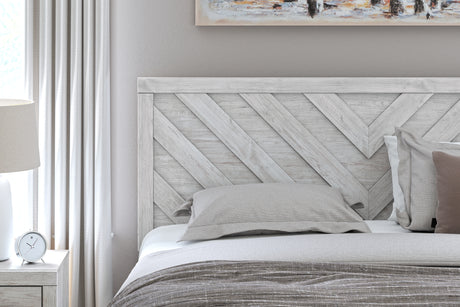 Cayboni King Panel Bed with Mirrored Dresser, Chest and Nightstand in Whitewash from Ashley - Luna Furniture