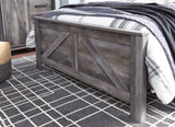 Wynnlow Queen Crossbuck Panel Bed with Mirrored Dresser and Chest in Gray from Ashley Furniture - Luna Furniture