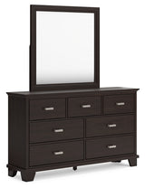 Covetown Queen Panel Bed with Mirrored Dresser in Dark Brown from Ashley Furniture - Luna Furniture