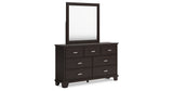 Covetown Queen Panel Bed with Mirrored Dresser and Nightstand in Dark Brown from Ashley Furniture - Luna Furniture