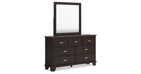 Covetown California King Panel Bed with Mirrored Dresser in Dark Brown from Ashley Furniture - Luna Furniture