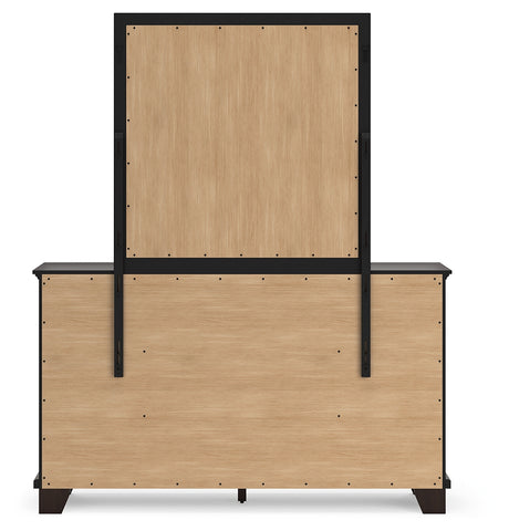 Covetown California King Panel Bed with Mirrored Dresser in Dark Brown from Ashley - Luna Furniture