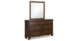 Danabrin Queen Panel Storage Bed with Mirrored Dresser and Nightstand in Brown from Ashley - Luna Furniture
