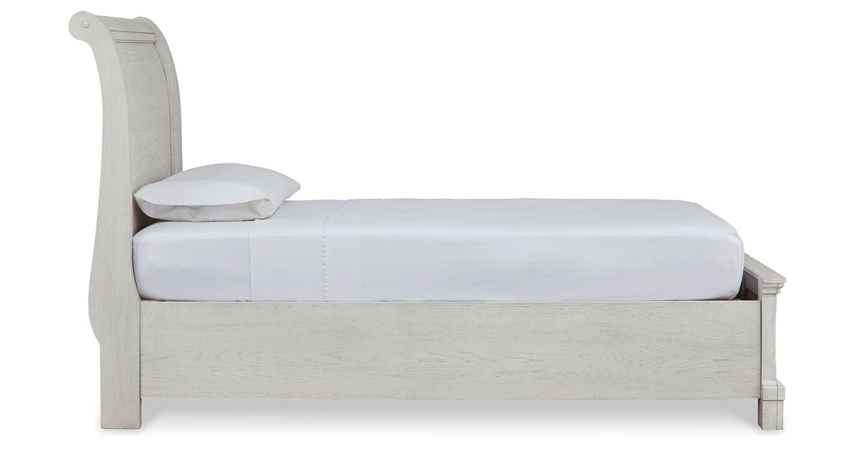 Robbinsdale Antique White Twin Sleigh Storage Bed and Dresser from Ashley - Luna Furniture