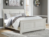 Robbinsdale Antique White King Sleigh Bed from Ashley - Luna Furniture