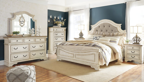 Realyn Chipped White Queen Upholstered Panel Bed with Mirrored Dresser, Chest and Nightstand from Ashley - Luna Furniture