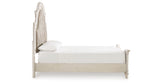 Realyn Chipped White Queen Upholstered Panel Bed from Ashley Furniture - Luna Furniture