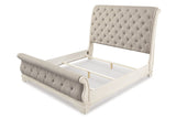 Realyn Chipped White Queen Upholstered Sleigh Bed from Ashley - Luna Furniture
