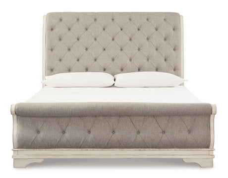 Realyn Chipped White Queen Upholstered Sleigh Bed from Ashley - Luna Furniture