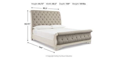 Realyn Chipped White Queen Upholstered Sleigh Bed from Ashley - Luna Furniture