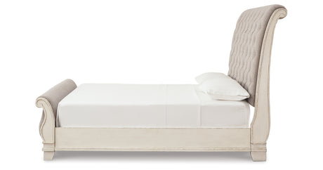 Realyn Two-tone Queen Upholstered Sleigh Bed and Chest from Ashley Furniture - Luna Furniture